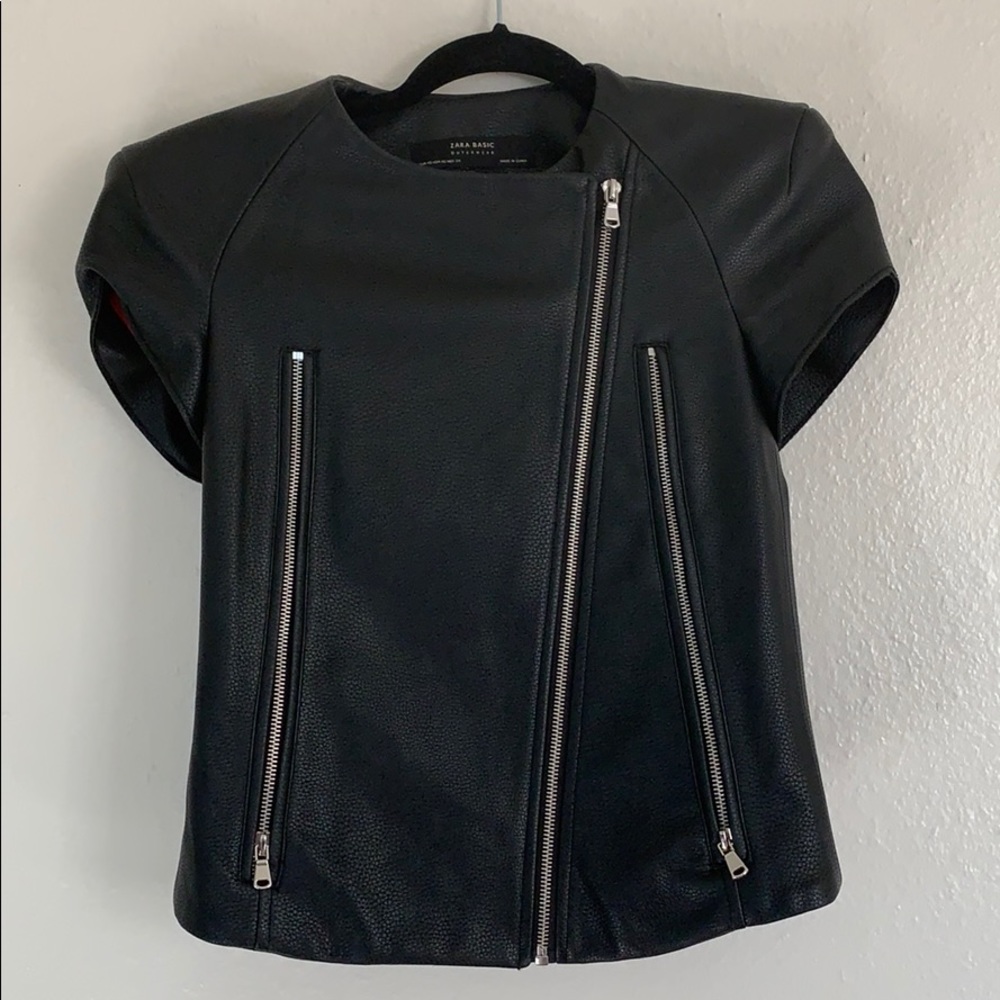 Leather padded, vest.